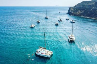 Half-Day Catamaran Cruise of Santorini with BBQ and Drinks
